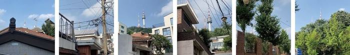 A sequence of Namsan Tower appearing across Huam-dong